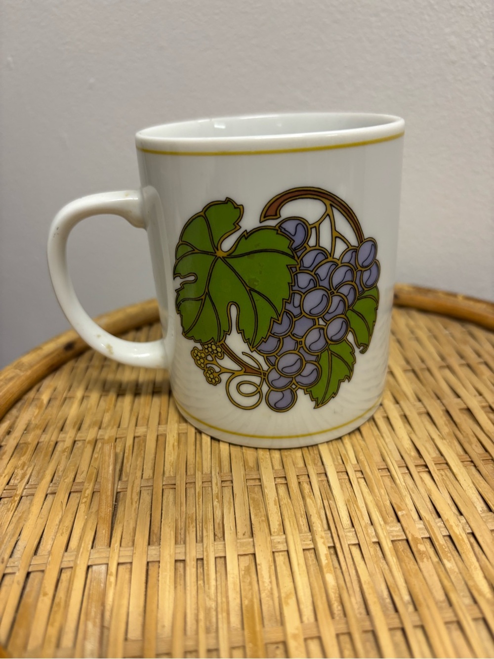 White Ceramic Mug with Green Leaves and Purple Grapes